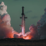 Starship and Super Heavy lift off from Starbase on Flight 14 amid billowing exhaust clouds