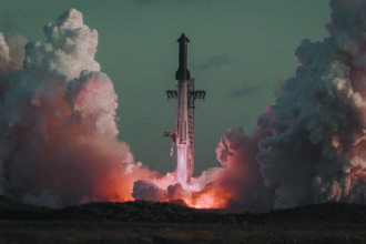 Starship and Super Heavy lift off from Starbase on Flight 14 amid billowing exhaust clouds